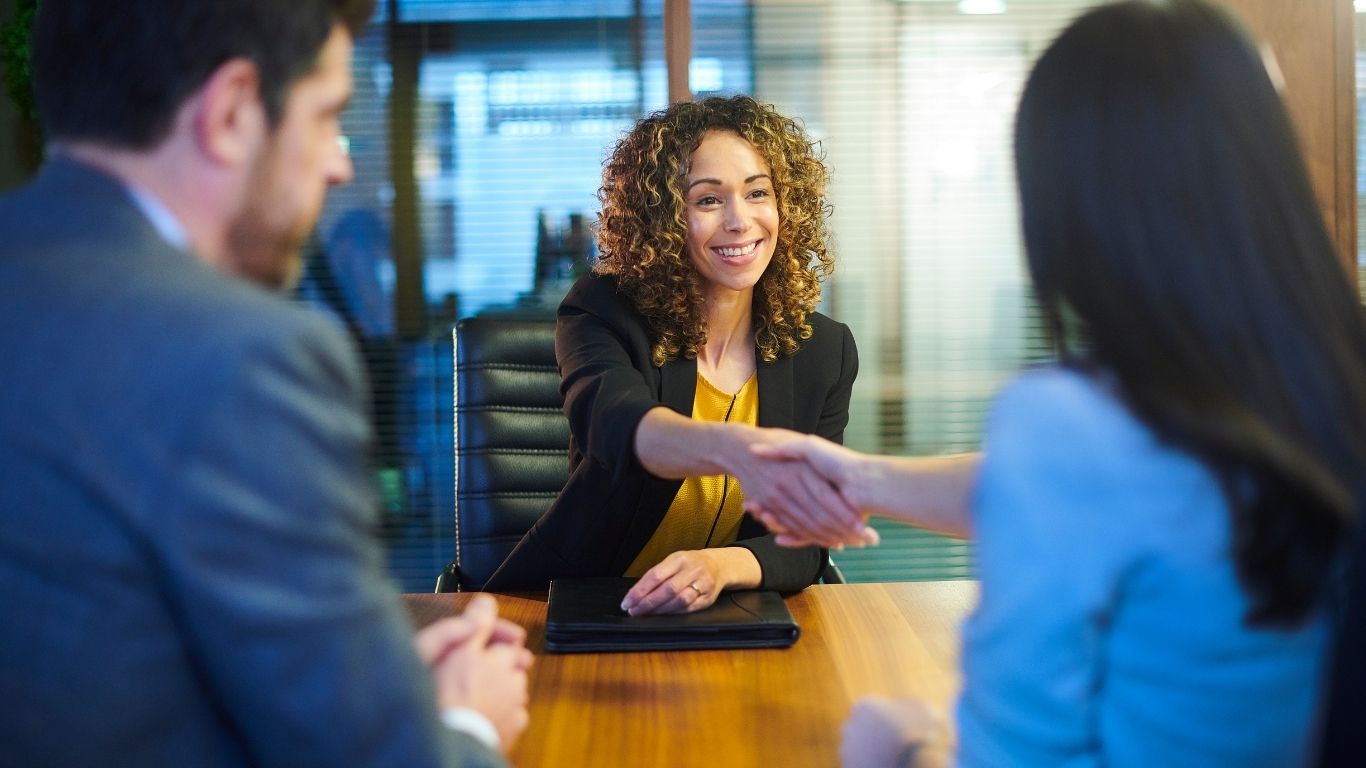 Client meeting and agreement for outsourcing services with a professional business consultant